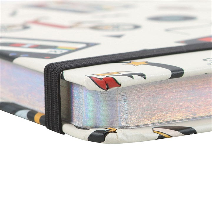 Retro 80s Print A5 Notebook features nostalgic designs of cassette tapes and game controllers, perfect for notes and sketches.