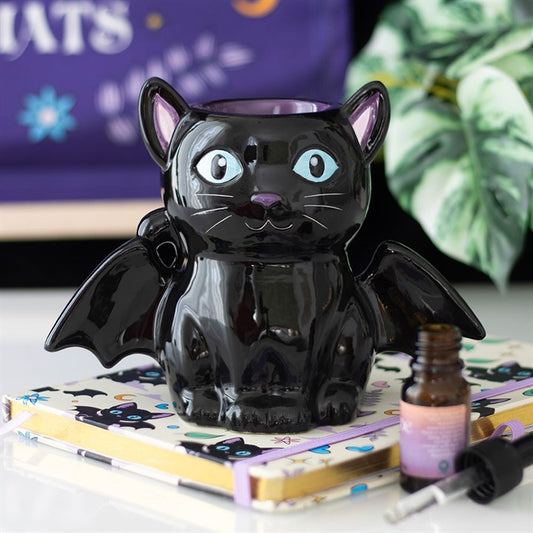 Black bat-winged cat oil burner and wax warmer with tealight slot, cute yet creepy mystical scent sanctuary.