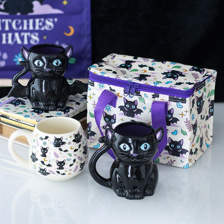 Insulated Cute and Creepy Cat Print Lunch Bag with purple handles, perfect for carrying snacks in style.