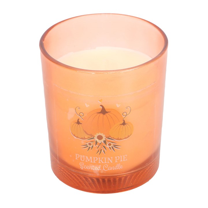 Autumn Wishes Pumpkin Pie Candle in a pumpkin-decorated glass holder, perfect for cosy evenings and gifting.