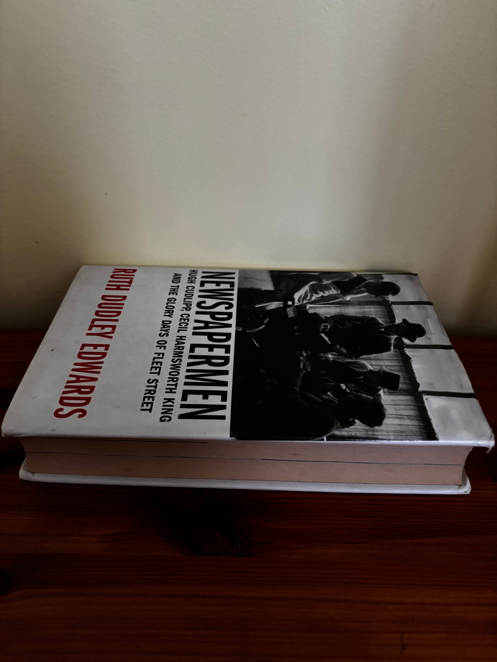 Book cover of "Newspapermen: Hugh Cudlipp, Cecil Harmsworth King and the Glory," revealing their Fleet Street legacy.