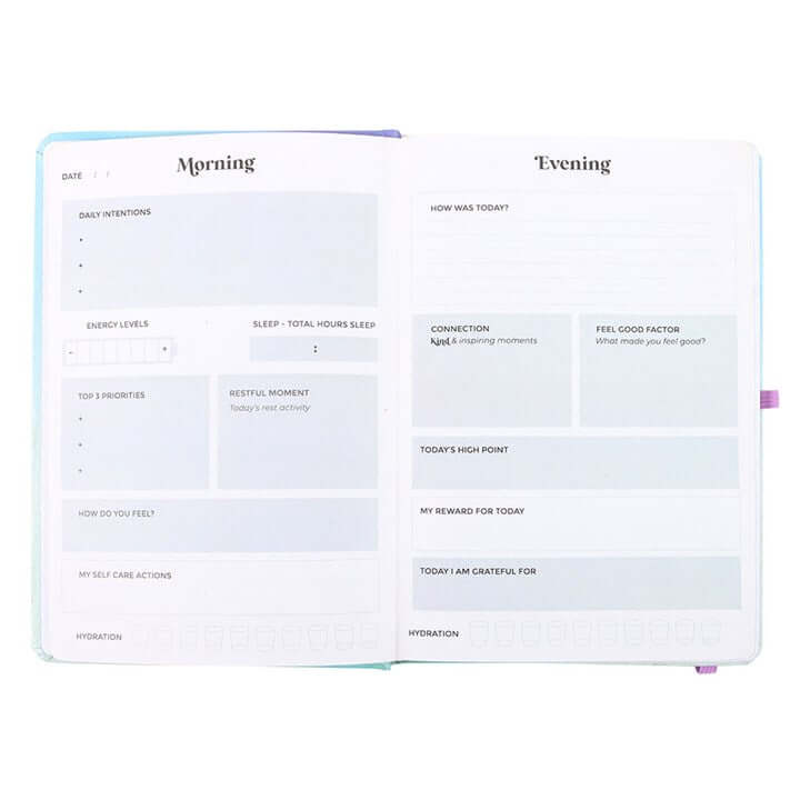 wellness journal with pen aura energy