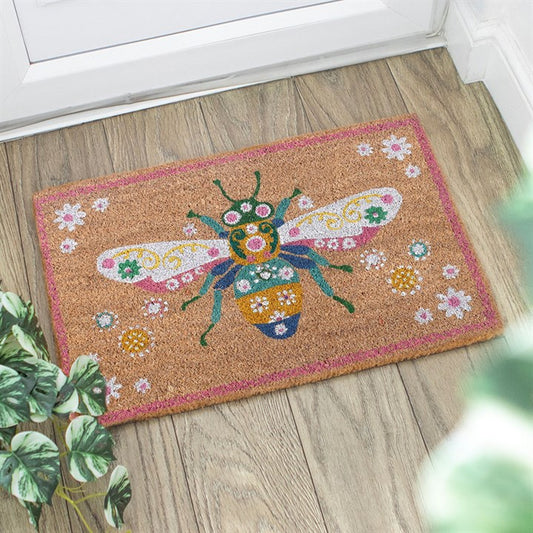 Brighten your entryway with the Natural Floral Bee Doormat, featuring a vibrant bee and floral design.
