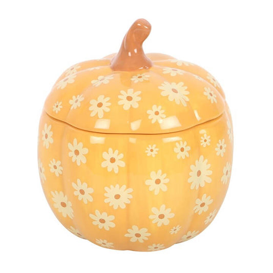 Groovy Floral Pumpkin Oil Burner: orange pumpkin-shaped ceramic oil burner with white floral pattern and lid.