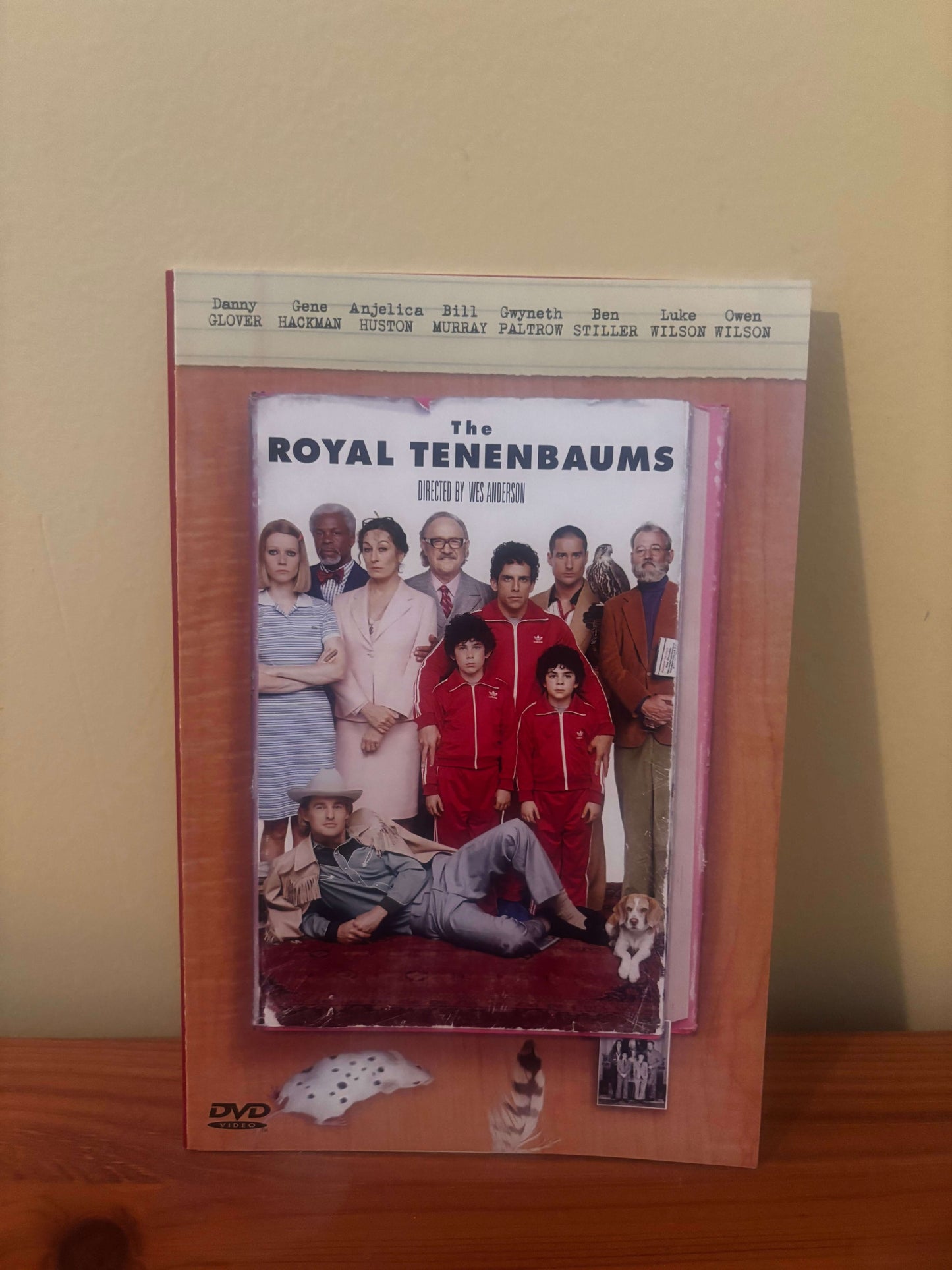 DVD case of 'The Royal Tenenbaums' on a wooden surface