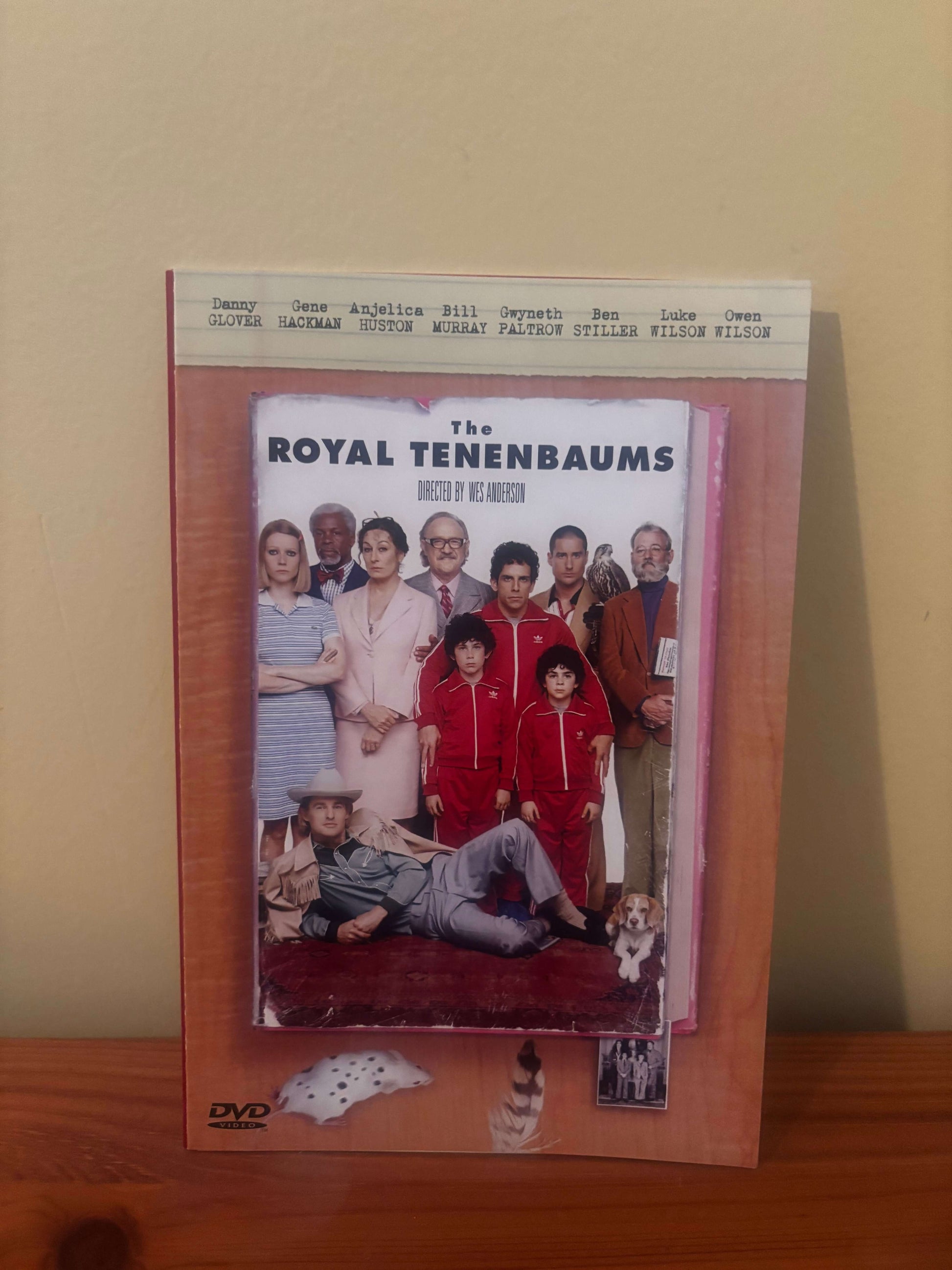 DVD case of 'The Royal Tenenbaums' on a wooden surface