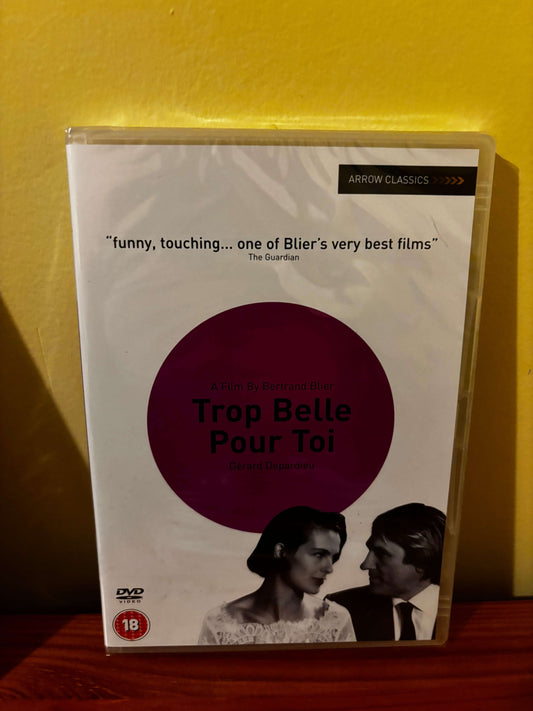 Trop Belle Pour Toi DVD cover; pink circle title, Gérard Depardieu film by Bertrand Blier, sealed Arrow Classics case.