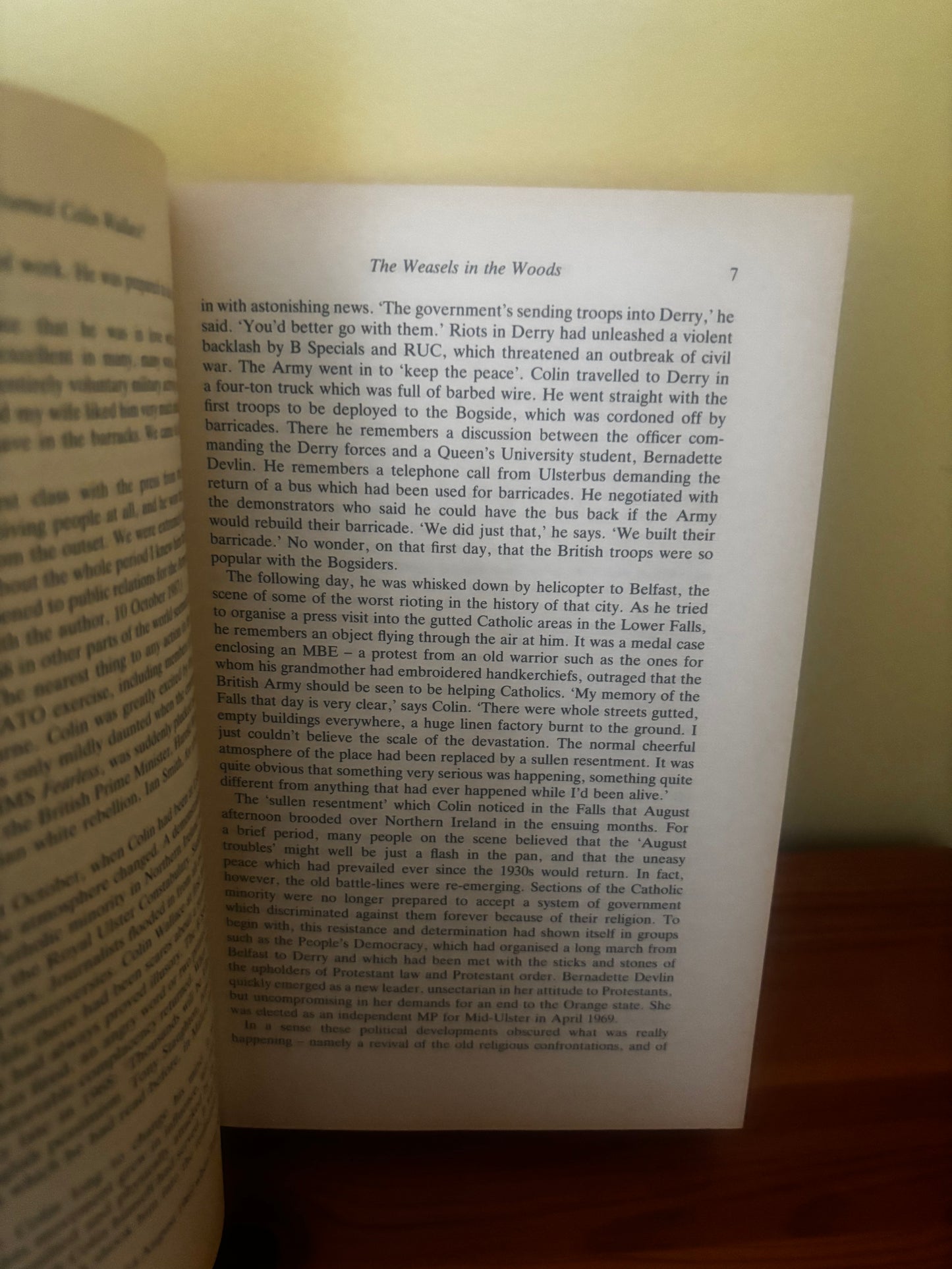 Open book with text on a yellowish background