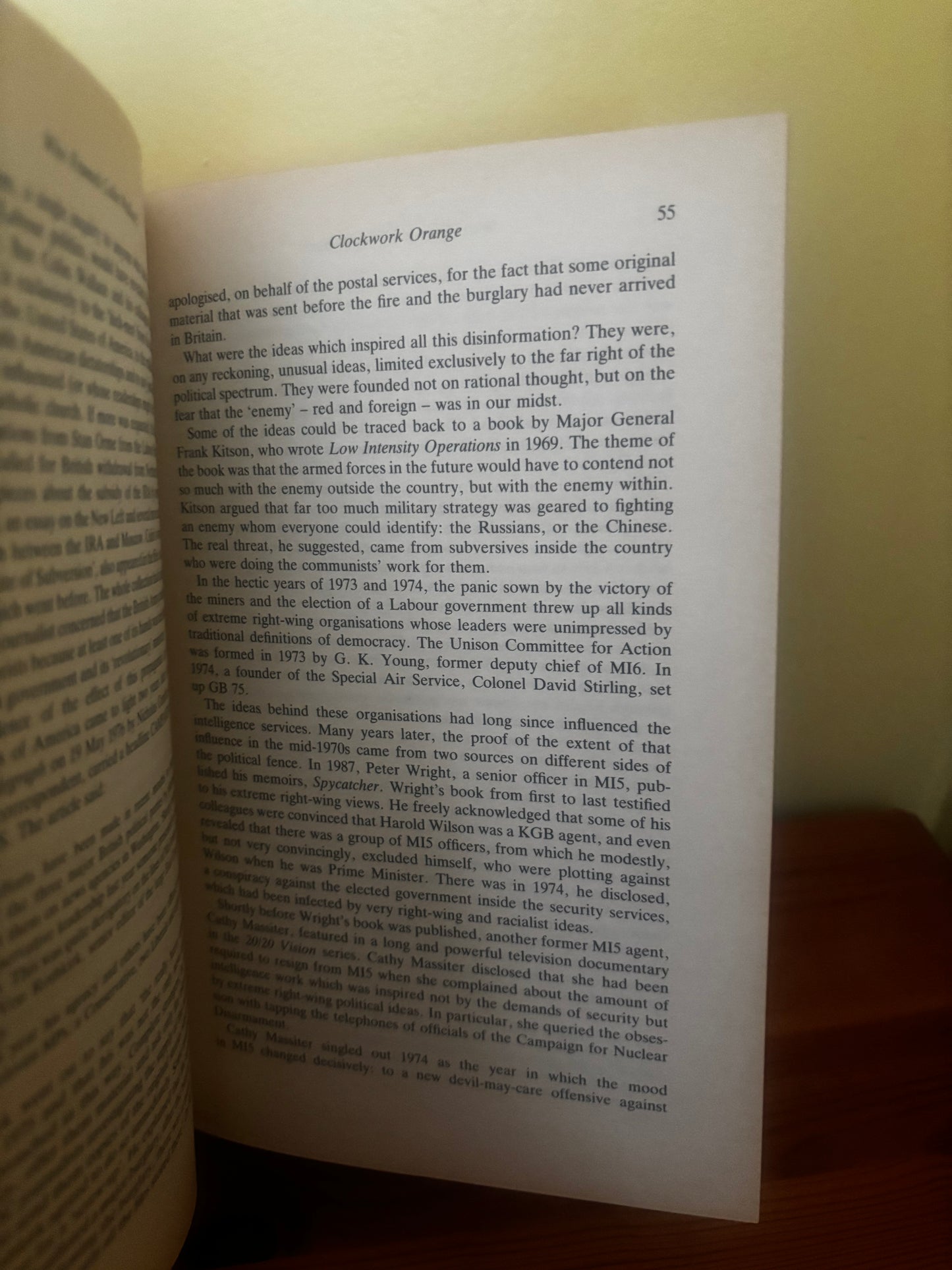 Open book with text pages on a plain background