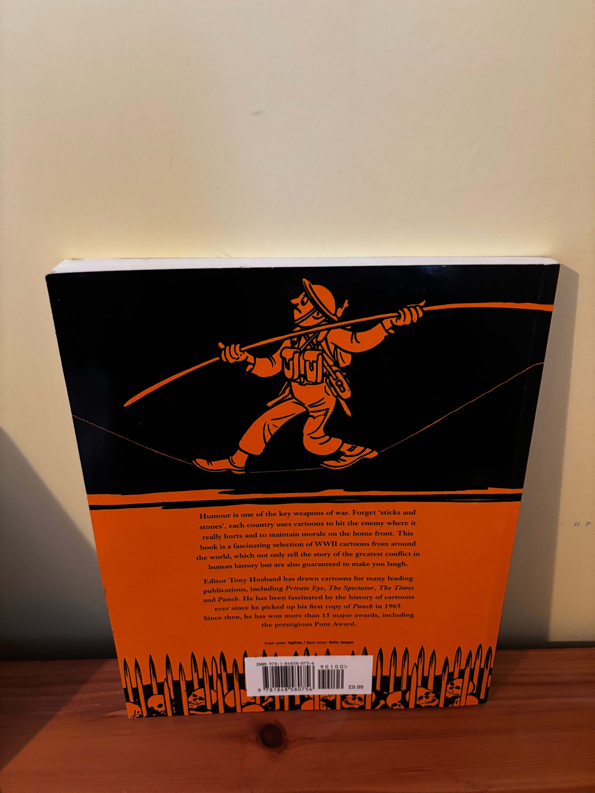 Book cover with an illustration of a person climbing a mountain on a black background