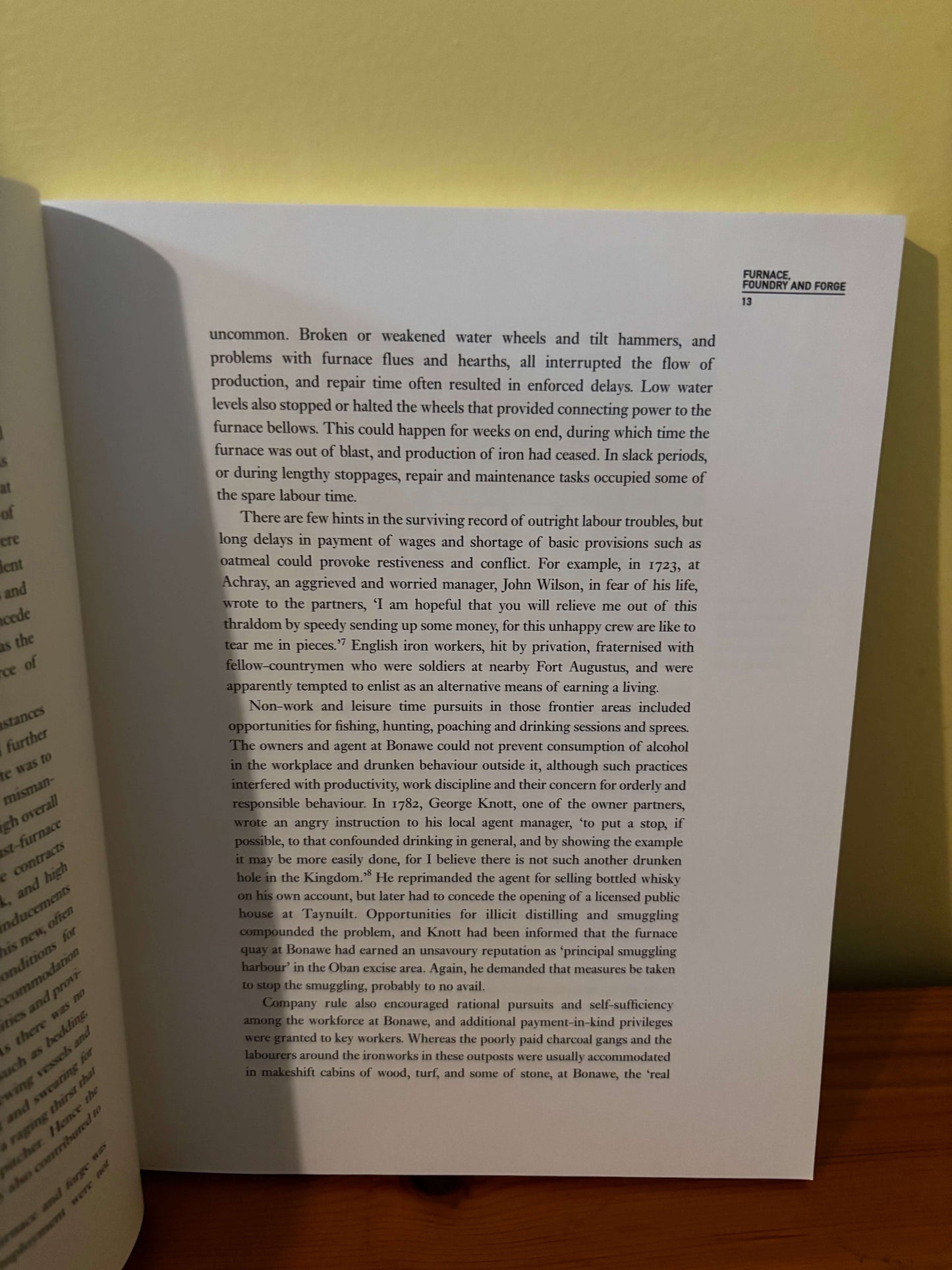 Open book with text on a plain background