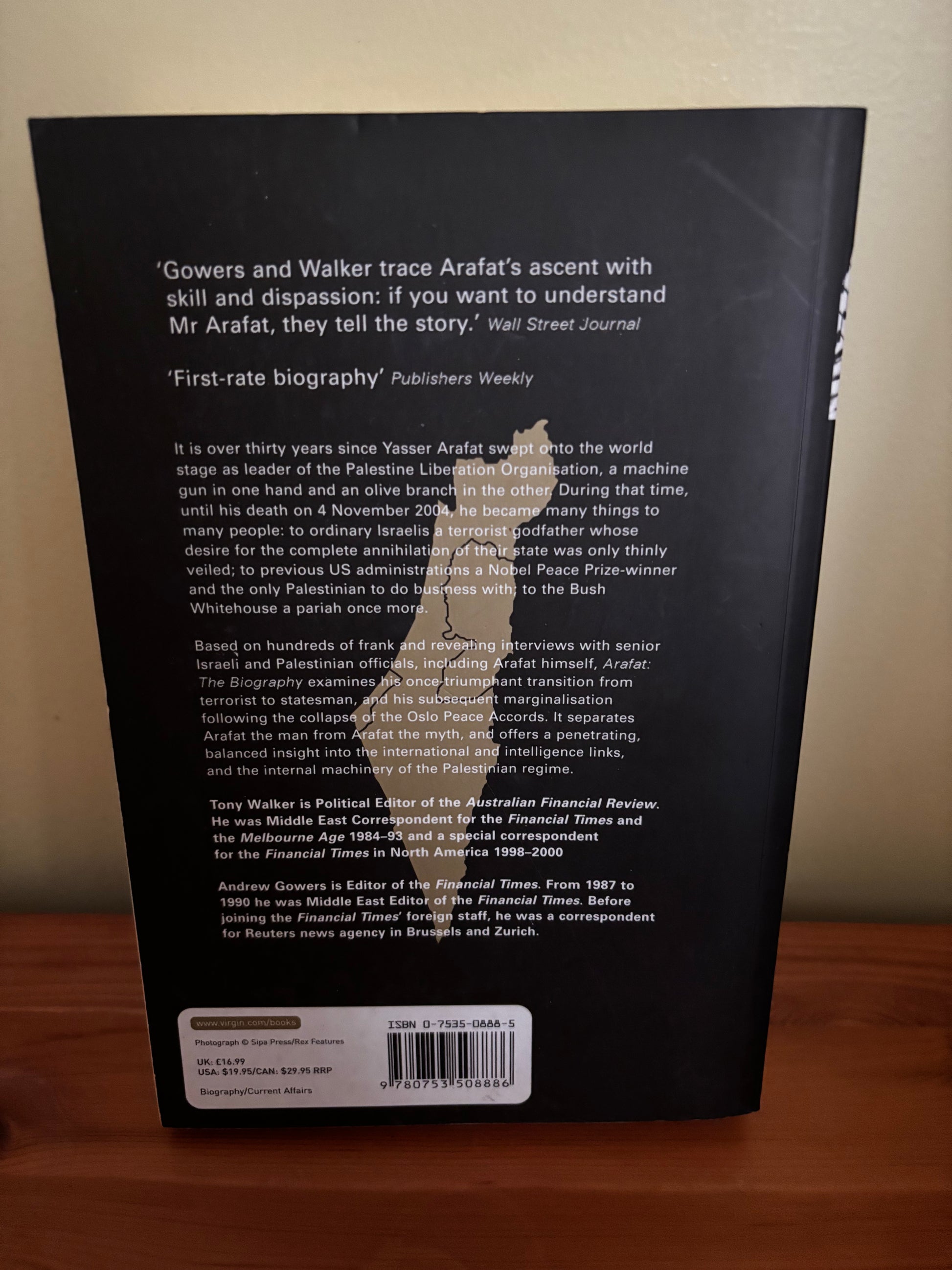 Arafat: The Biography By Tony Walker - Insightful Read explores Yasser Arafat's complex life and legacy at [Store Name].