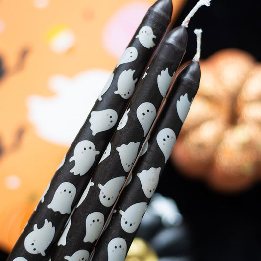 Set of 3 Ghost Print Taper Candles, perfect for spooky Halloween décor with playful ghost designs.