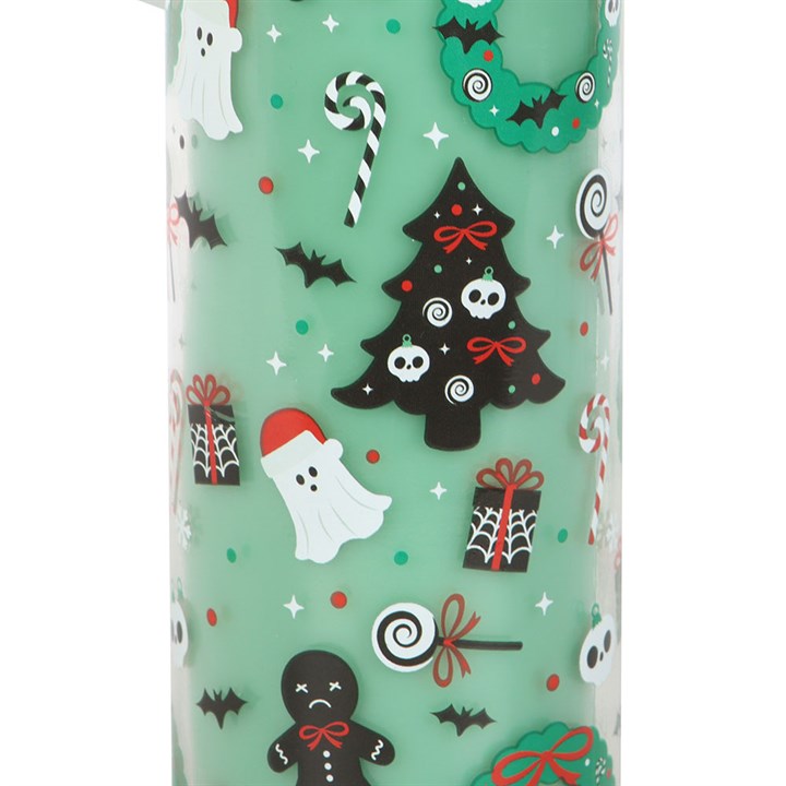 Merry Creepmas Cursed Candy Cane Tube Candle featuring haunted ginger-dead men and ghostly figures on a green design.