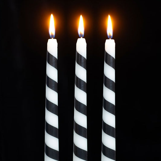 Set of 3 Black Candy Cane Taper Candles - Unscented, perfect for gothic festive decor and elegant table settings.