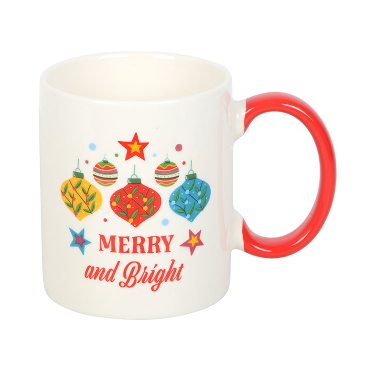 Brighten your festive moments with the Merry and Bright Bauble Mug, featuring a cheerful bauble design and red handle.