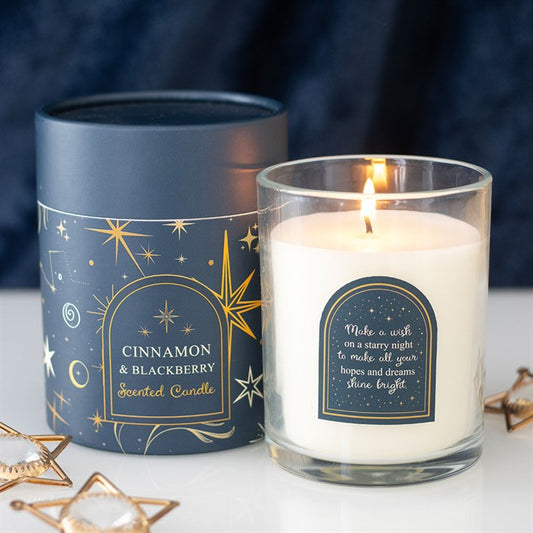 Brighten your space with the Starry Night Cinnamon & Blackberry candle, featuring a festive design and rich aroma.