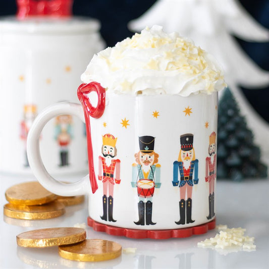 Festively designed Nutcracker Print Mug with Bow, perfect for cosy drinks by the fire this holiday season.