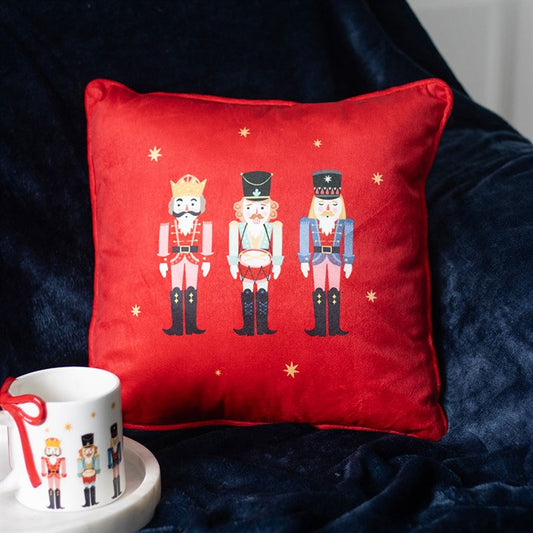 Square Nutcracker Cushion adds festive charm with its red fabric and traditional nutcracker design, perfect for Christmas decor.
