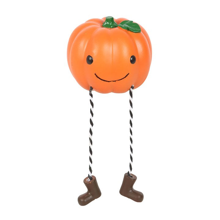 Adorn your Halloween with this Cute Smiling Pumpkin Shelf Sitter Ornament, featuring playful legs and a cheerful face.