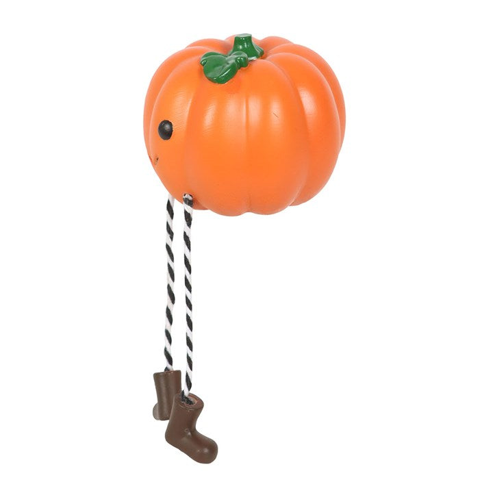 Cute Smiling Pumpkin Shelf Sitter Ornament with striped legs and boots, perfect for festive Halloween decor.