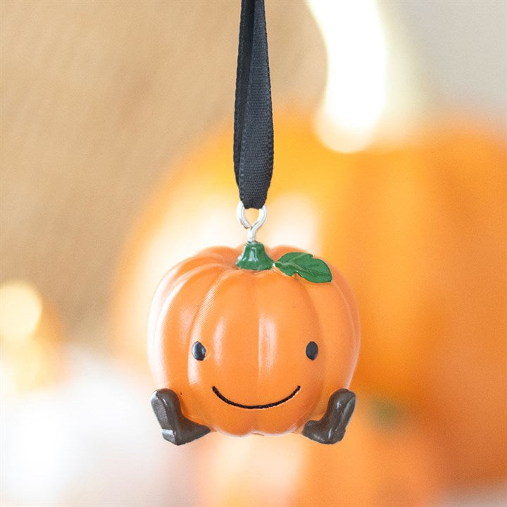 Brighten your Halloween with the Cute Smiling Pumpkin Hanging Ornament, perfect for festive décor and gifting.