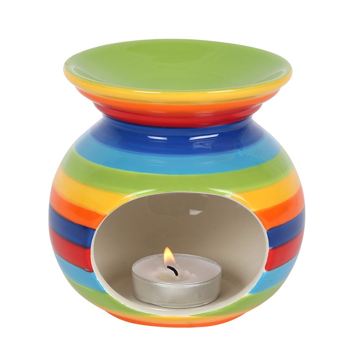 Rainbow-striped ceramic oil burner with tealight holder for fragrance oils and wax melts; 10.5 cm high.