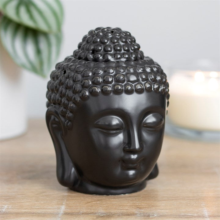 Black Buddha Head Oil Burner - matte black Buddha head with serene expression for tranquil ambience