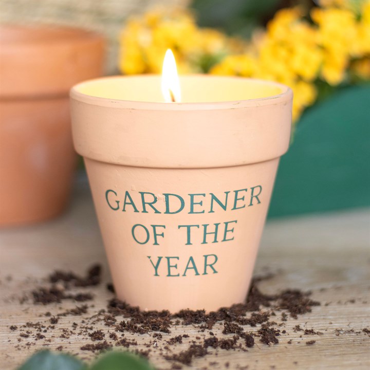 Elegant Gardener of the Year Citronella Candle in a ceramic pot, perfect for outdoor spaces and repelling insects.