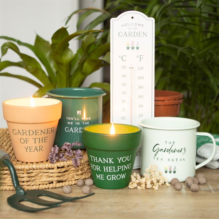 Elegant Gardener of the Year Citronella Candle in a ceramic pot, perfect for outdoor elegance and insect repellent.