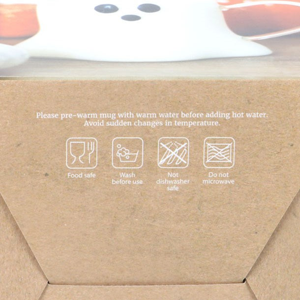 Ghost Shaped Glass Mug on packaging with care icons (wash before use, not dishwasher safe, do not microwave).