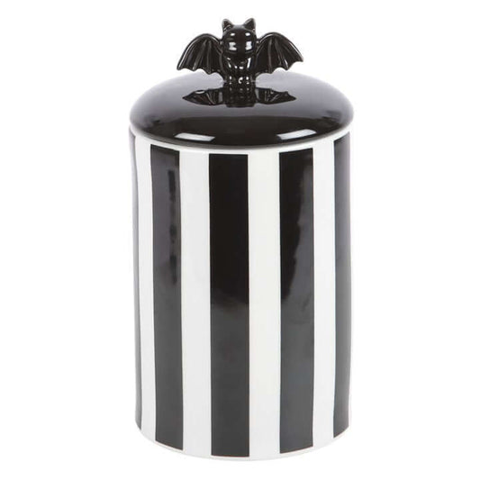 Striped Bat Storage Jar, ceramic with black and white vertical stripes and a bat-shaped lift-off lid.