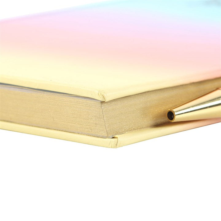 Multicoloured Gratitude Journal with Amethyst Pen features a vibrant cover and elegant pen for mindful reflection.