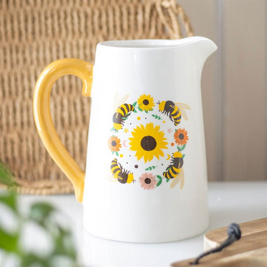 Brighten your home with the Bee and Sunflower Ceramic Flower Jug, featuring a sunny design and cheerful yellow handle.