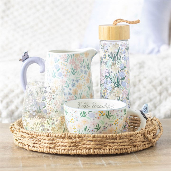 Ditsy Floral Print Stemless Glass featuring a delicate purple floral design, perfect for gifts and special occasions.