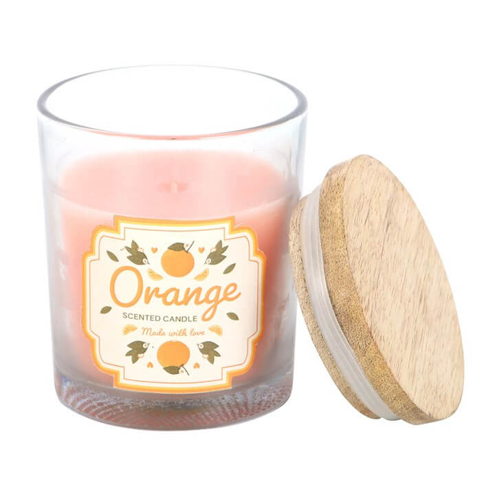 Brighten your home with the Orange Scented Candle, featuring a fruity design and a wooden lid for a fresh touch.