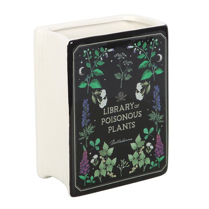 Dark elegance meets functionality in the Poisonous Plants Book Shaped Vase, perfect for flowers or as a striking display.