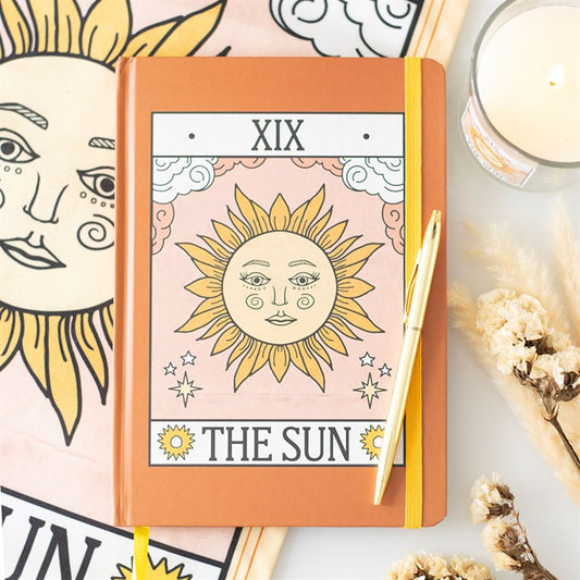 The Sun Vintage Tarot A5 Notebook features a beautiful tarot card design, perfect for journaling and note-taking.