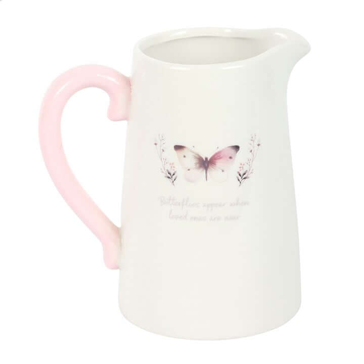 White Butterfly Print Ceramic Flower Jug With Heartfelt Message featuring delicate butterfly design and pink handle.