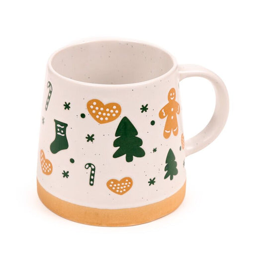 Stoneware mug featuring a gingerbread man and festive motifs: trees, hearts and candy canes on white with orange base.