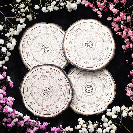 Rustic Wheel of the Year Coaster Set featuring four wood slice designs, perfect for spiritual homes and altars.