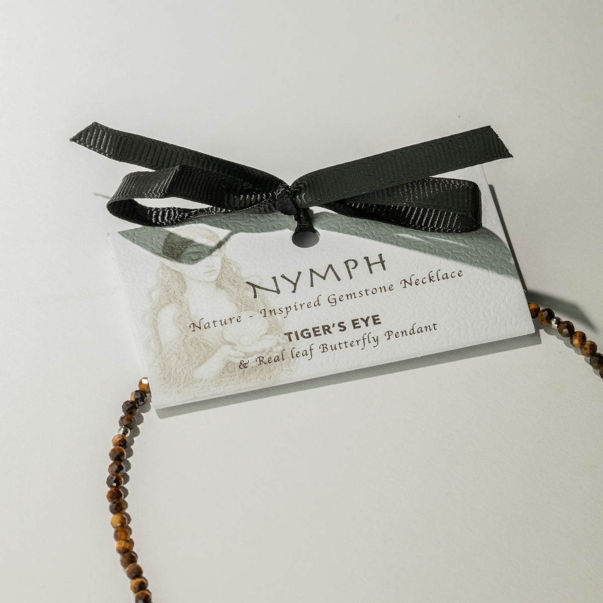Tiger's Eye Gemstone Necklace with Real Leaf Butterfly Pendant