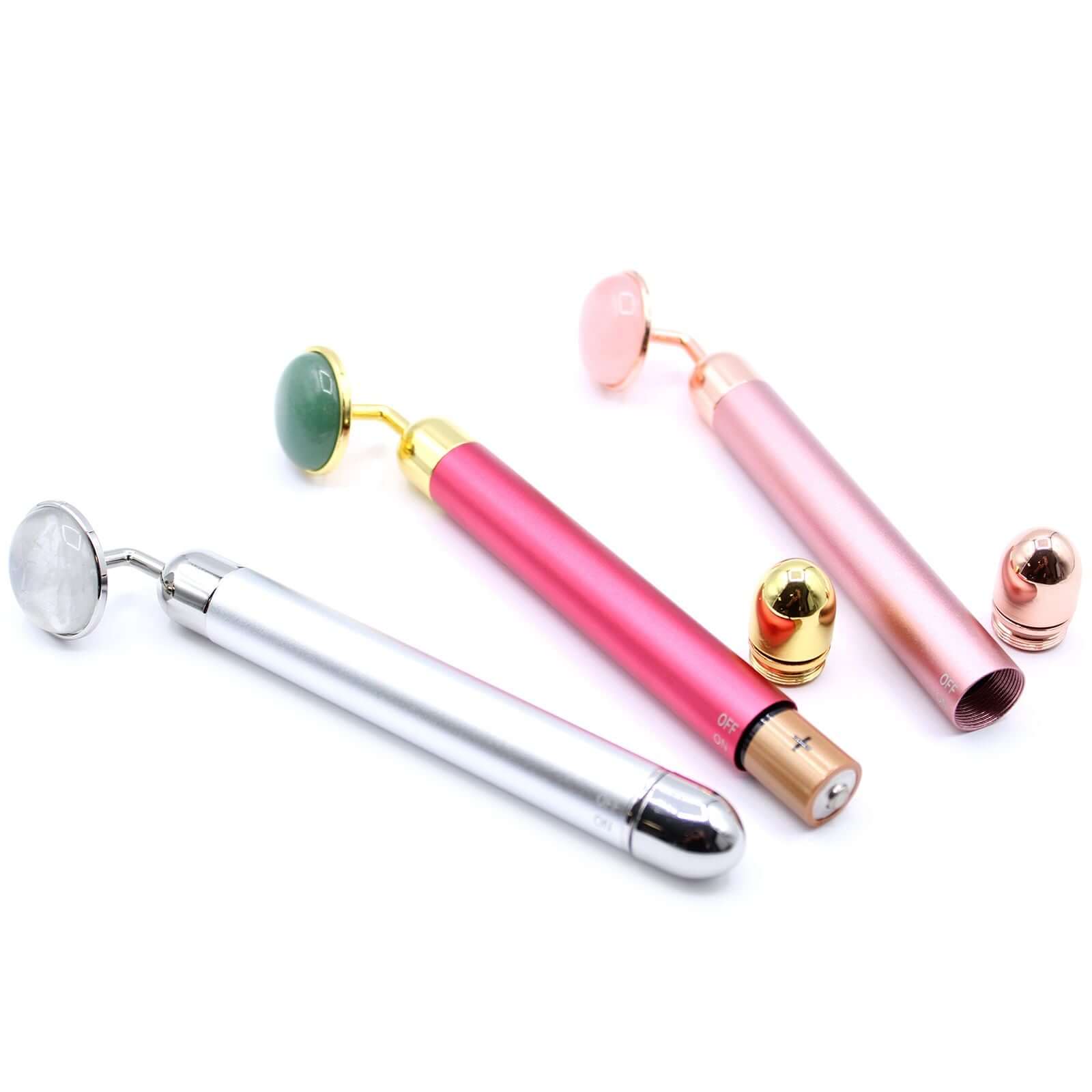 Gemstone Vibration Pad Jade Facial Massager With Gold Trim - Jade rollers in various colors for skincare.