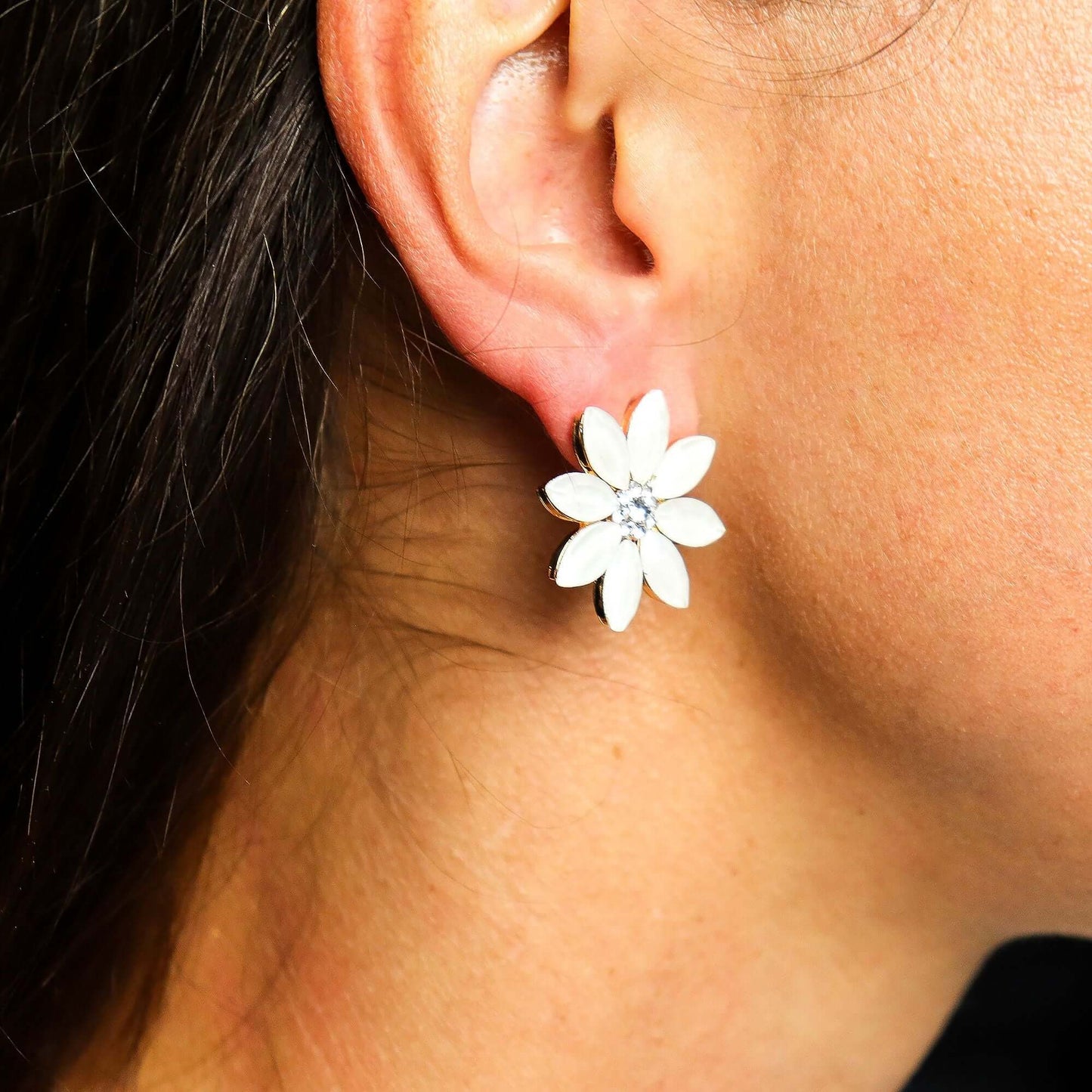 Pearl Vintage Glass Flower Earrings With Crystal Centre worn by a woman, featuring a flower design and crystal centerpiece.