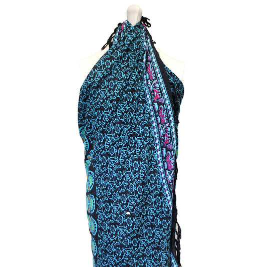 Stunning Peacock Classic Mandala Sarongs with intricate feather design in vibrant blues and greens on a dark base.