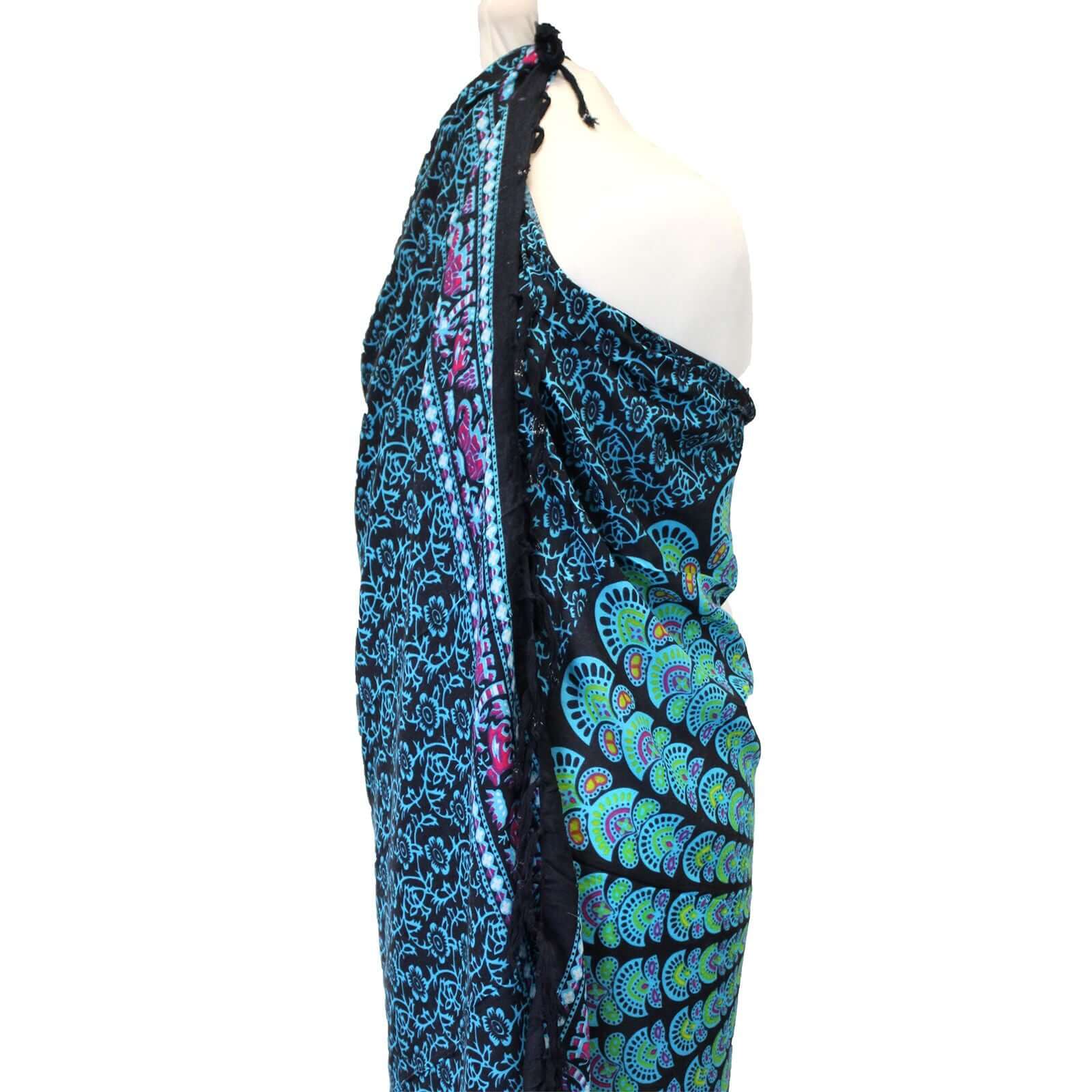 Elegant Peacock Classic Mandala Sarongs showcase vibrant peacock feather designs in rich blues and greens.