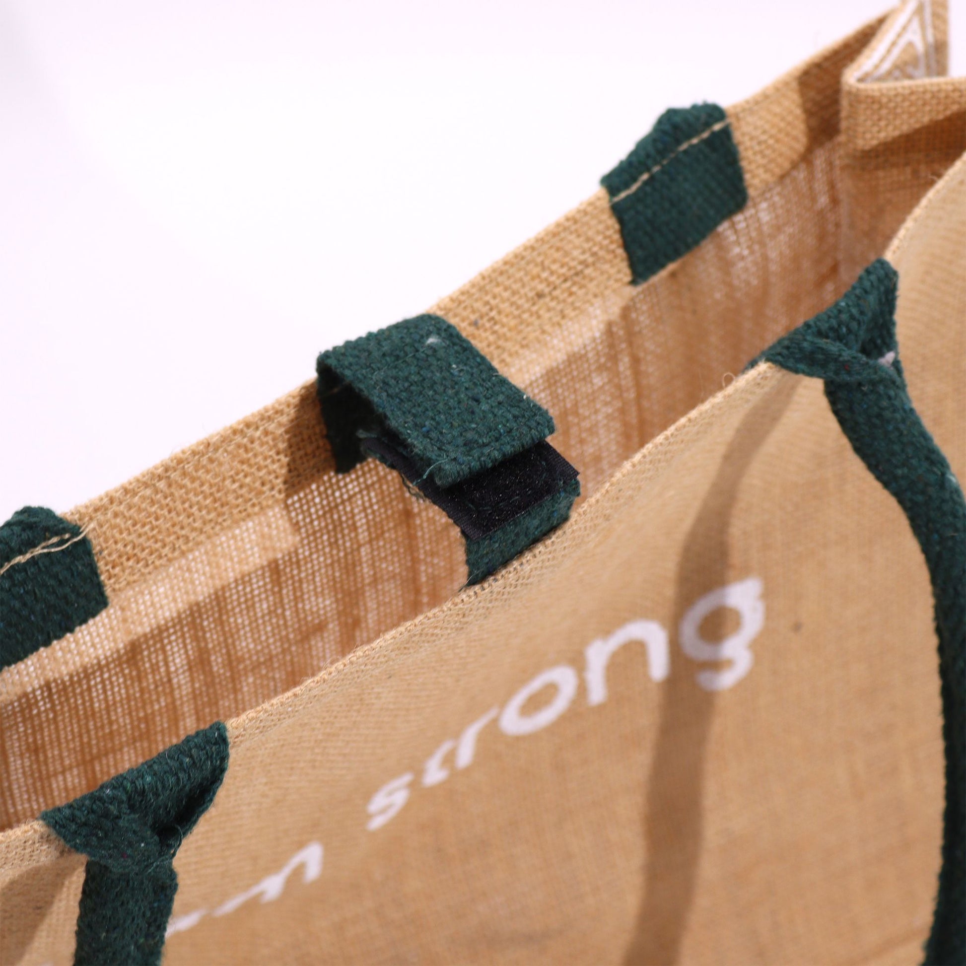 Hop Hare Jute Big Bag - I am Loved showing natural jute top, green handles, Velcro tab and partial white print