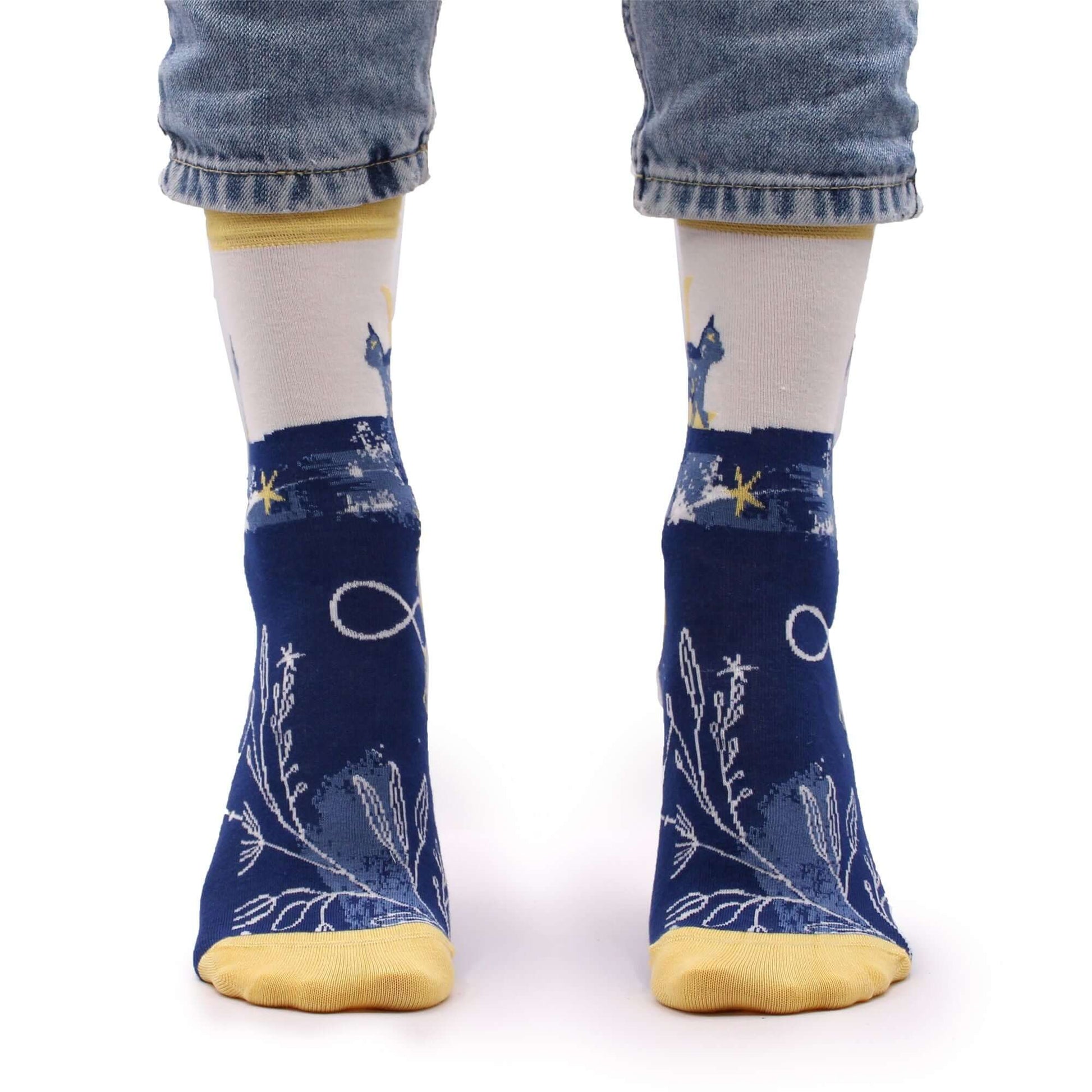 Hop Hare Bamboo Socks S/M - Midnight Cat shown on feet, featuring a whimsical cat and floral design.