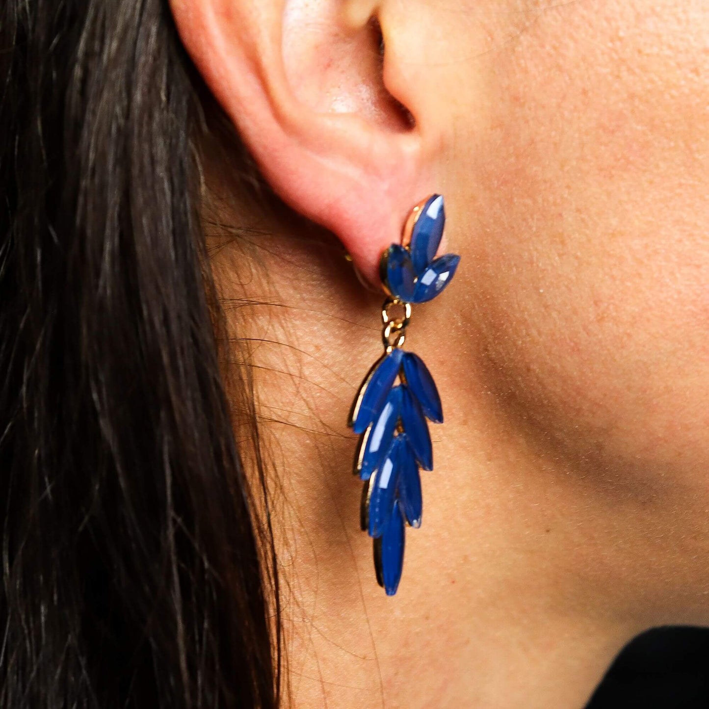 Royal Blue Vintage Glass Long Drop Earrings With Leaf Motif worn by model in close-up, showcasing ocean-inspired design.
