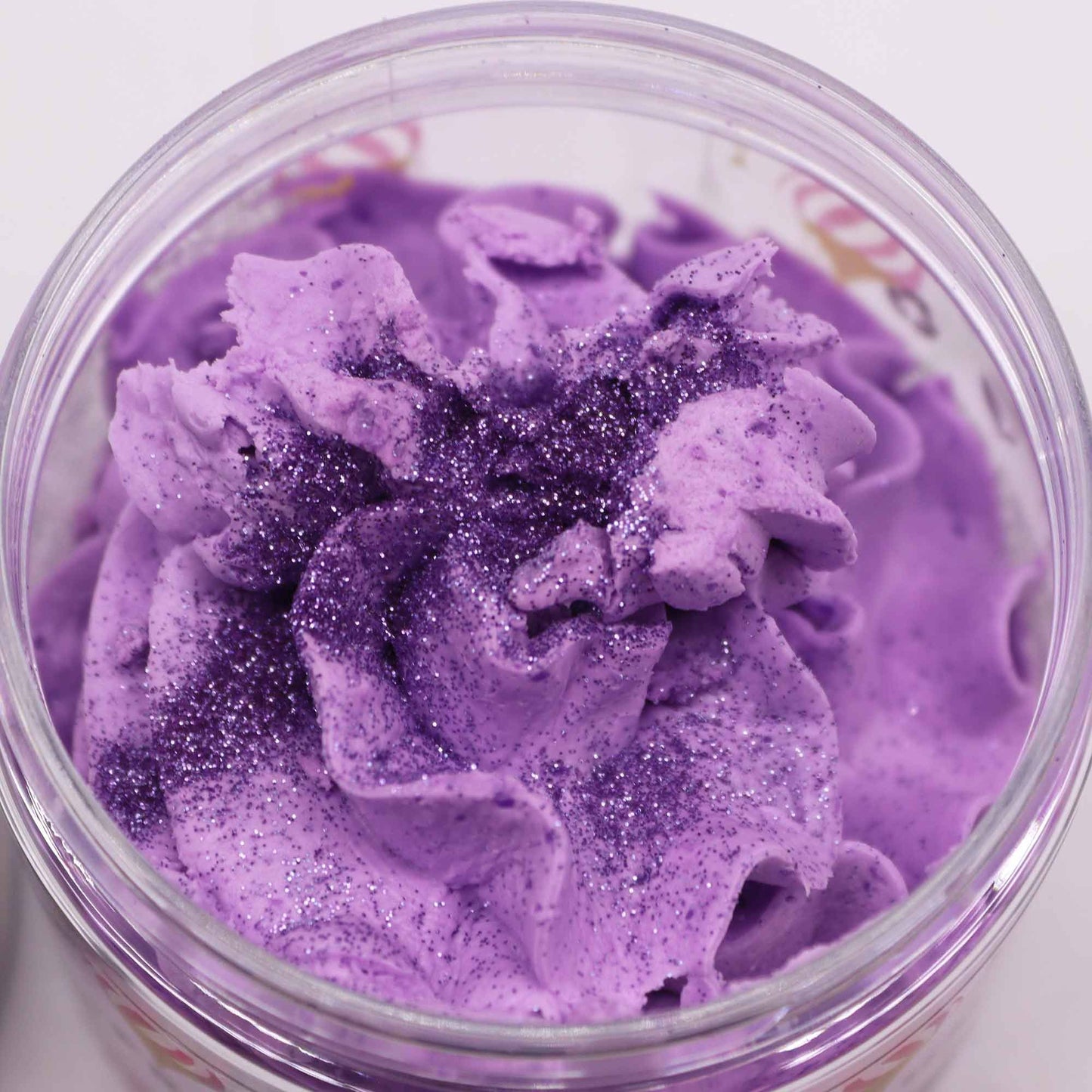 Frosted Sugar Plum whipped soap 120g in a jar, lilac swirls with glittery purple specks.